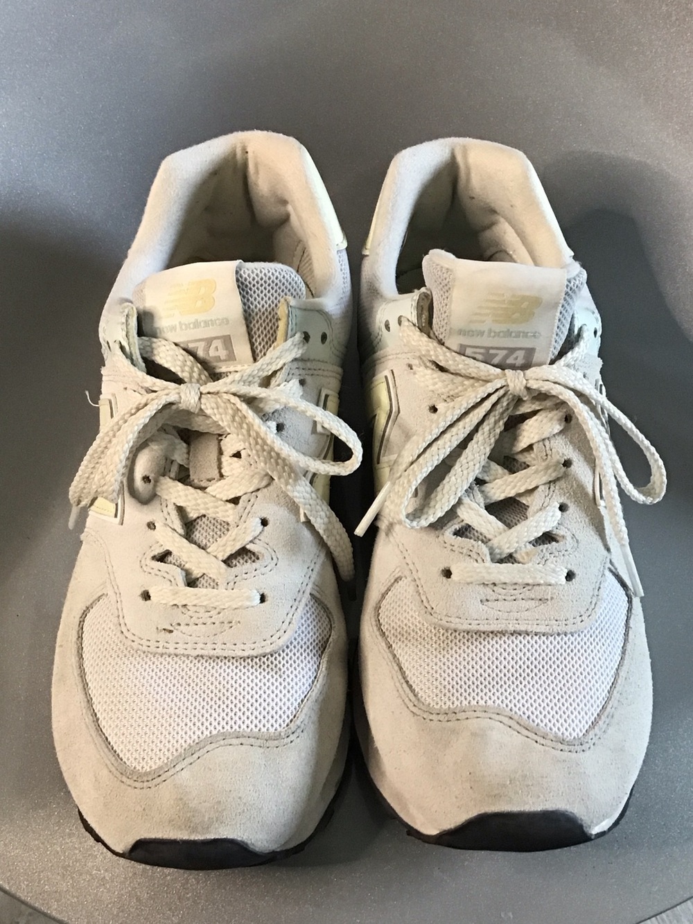 New Balance women Light Gray and White 574 Sneakers